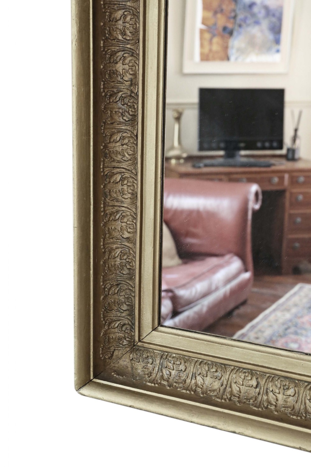 A large mid-19th-century rectangular mirror featuring a heavy gold gilt frame with carved foliage moulding. View VI