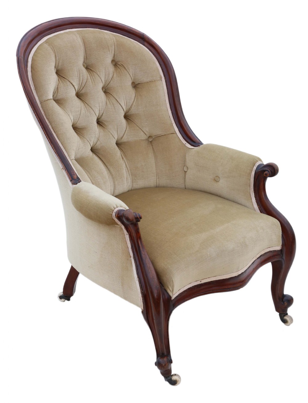 A Victorian mahogany spoon-back armchair featuring deep-buttoned beige velvet upholstery and cabriole front legs with castors. View IV
