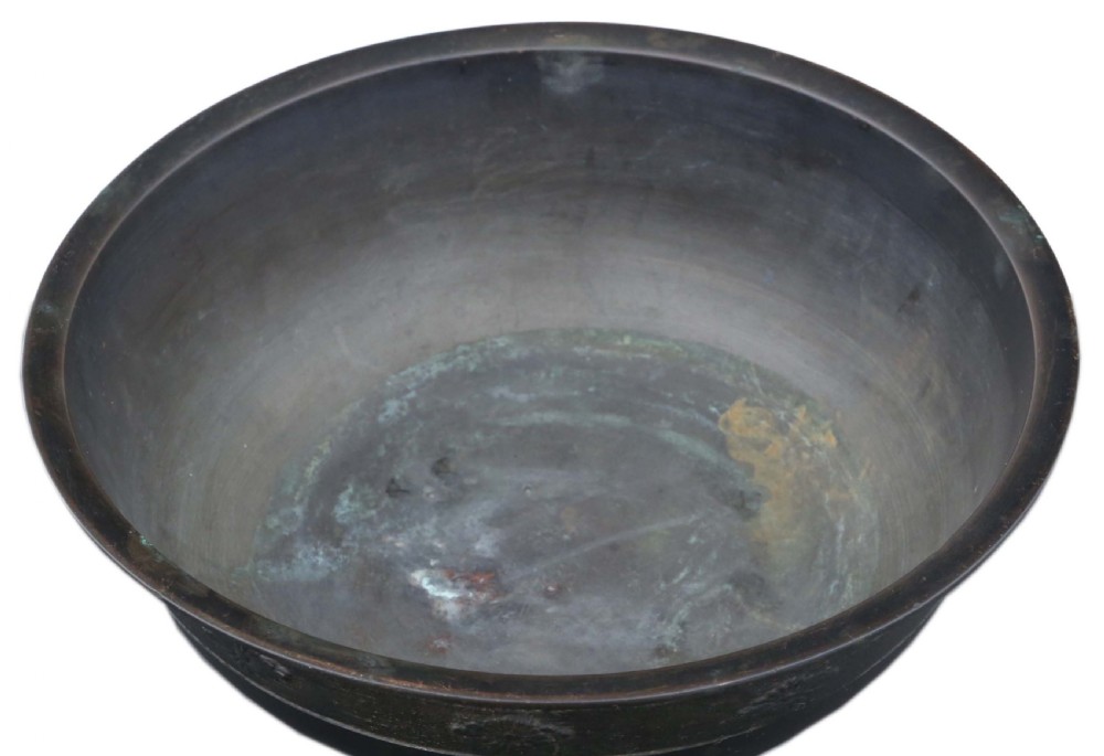 A dark bronze Japanese Edo period vessel featuring a flared rim with floral relief bands set upon a flared pedestal base. View V