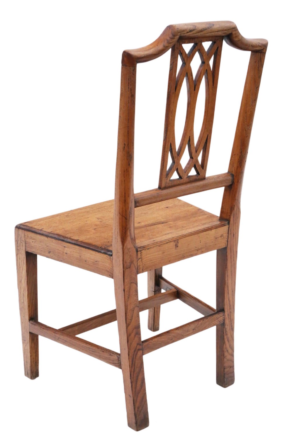 A set of six 19th-century elm dining chairs featuring lattice-carved back splats, wooden panel seats, and sturdy stretchers, including five side chairs and one carver armchair. View IX