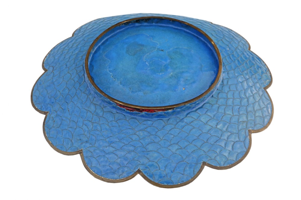 A large Japanese Meiji period scalloped cloisonne charger plate featuring a black central panel decorated with wisteria and birds, framed by intricate polychrome enamel outer borders. View III