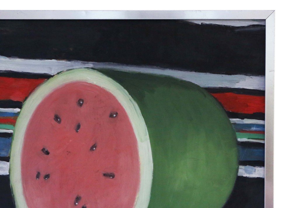 A mid-century style oil on board still life painting depicting a cut watermelon set against a boldly striped background, presented in a white mount and slim metal frame. View II