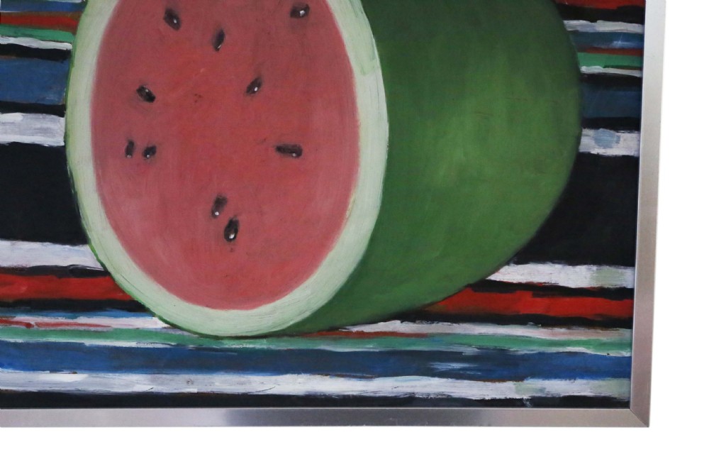 A mid-century style oil on board still life painting depicting a cut watermelon set against a boldly striped background, presented in a white mount and slim metal frame. View V
