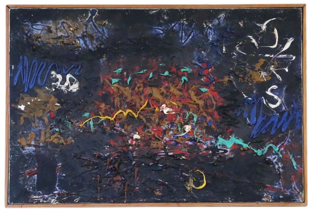 A rectangular mid-century abstract painting featuring heavy impasto paint relief in blue, yellow, red, and white across a dark textured background, enclosed in a slim wooden frame.