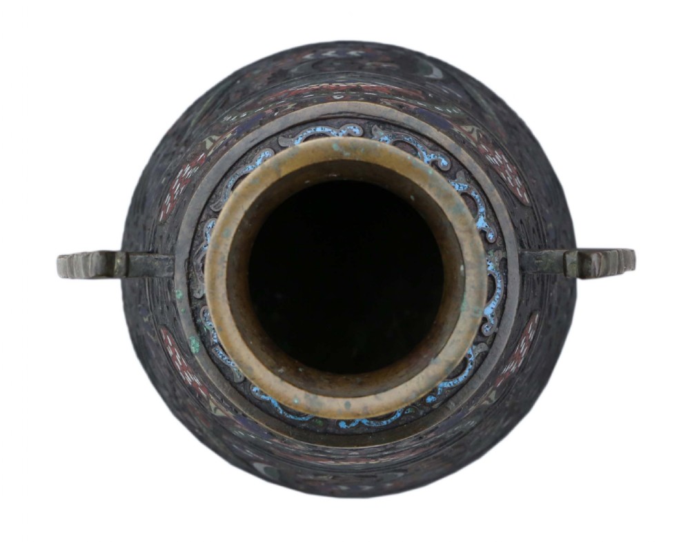 A baluster-shaped dark bronze vase featuring twin zoomorphic handles and colourful champleve enamel depictions of mythical birds and floral motifs. View V