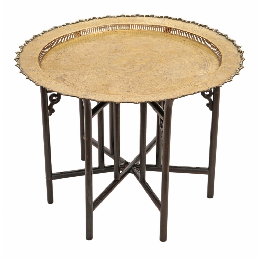 Antique quality very large oriental brass charger tray coffee table on ebonised stand C1920