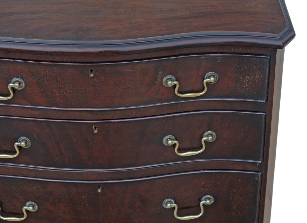 Antique quality Georgian revival small mahogany serpentine chest of drawers View IV