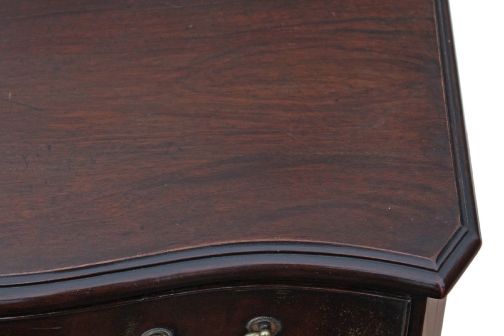 Antique quality Georgian revival small mahogany serpentine chest of drawers View VI