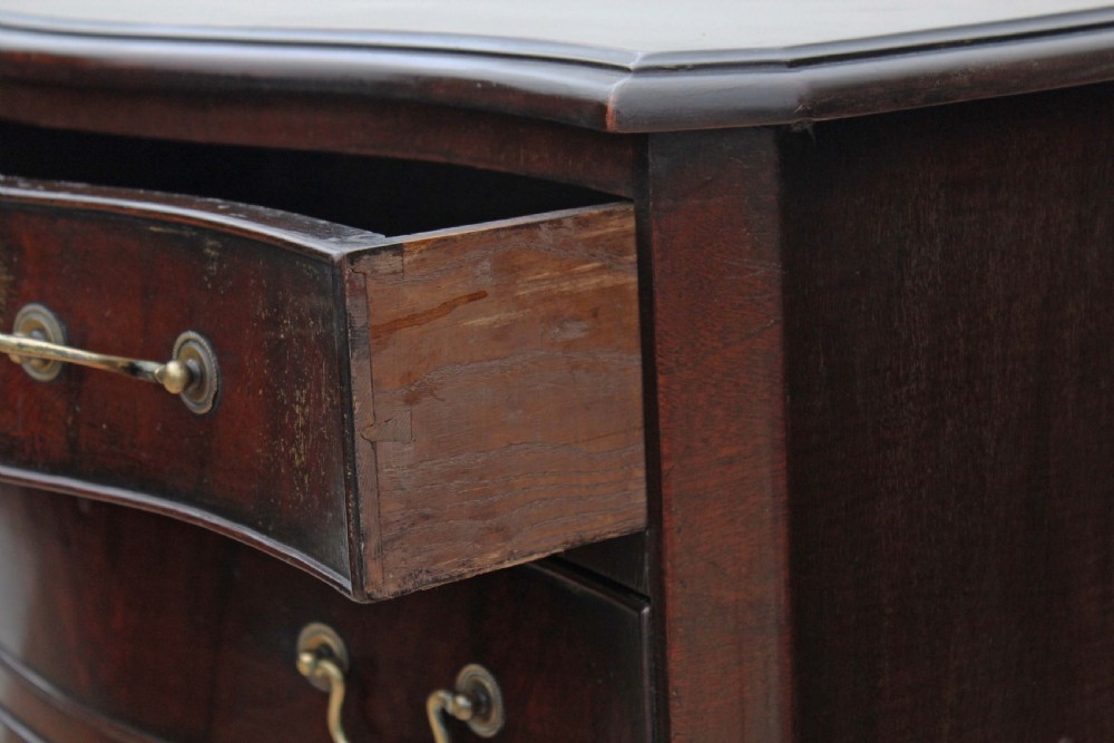 Antique quality Georgian revival small mahogany serpentine chest of drawers View VII