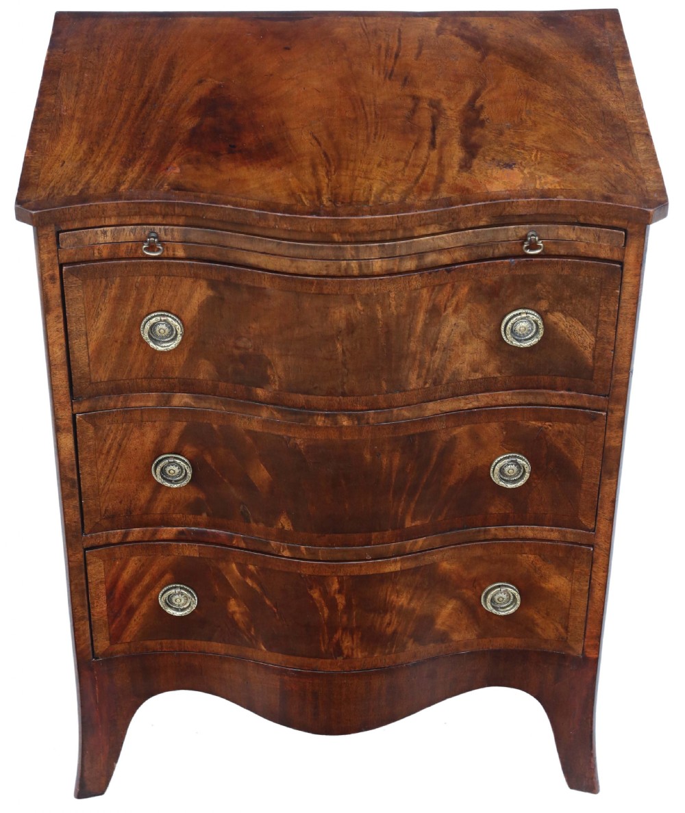 Antique quality small Georgian revival flame mahogany serpentine front chest of drawers C1900