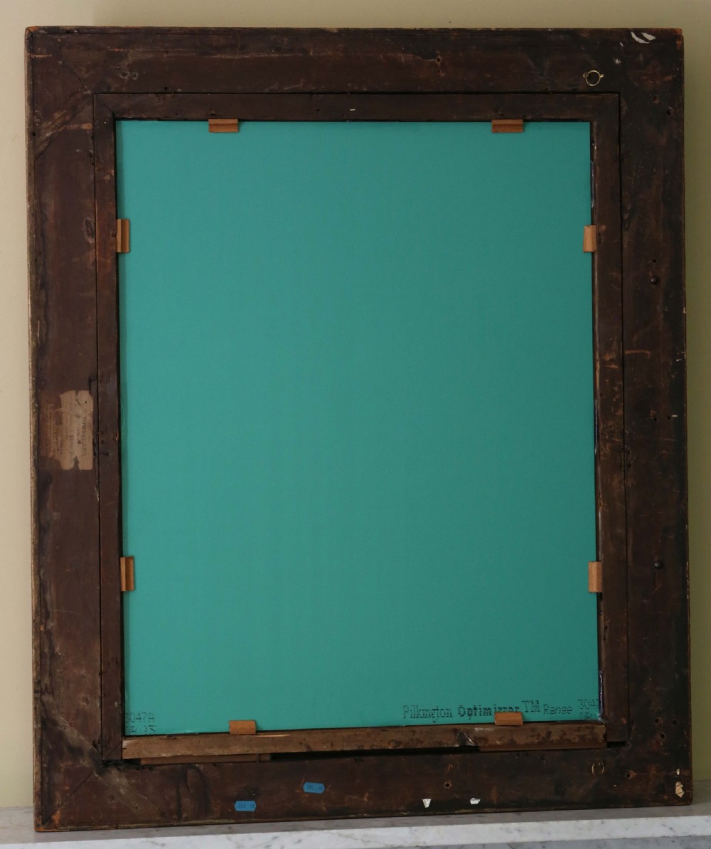 A large 19th-century rectangular wall mirror featuring an ornate gold leaf gilded frame decorated with floral and leaf mouldings. View VII