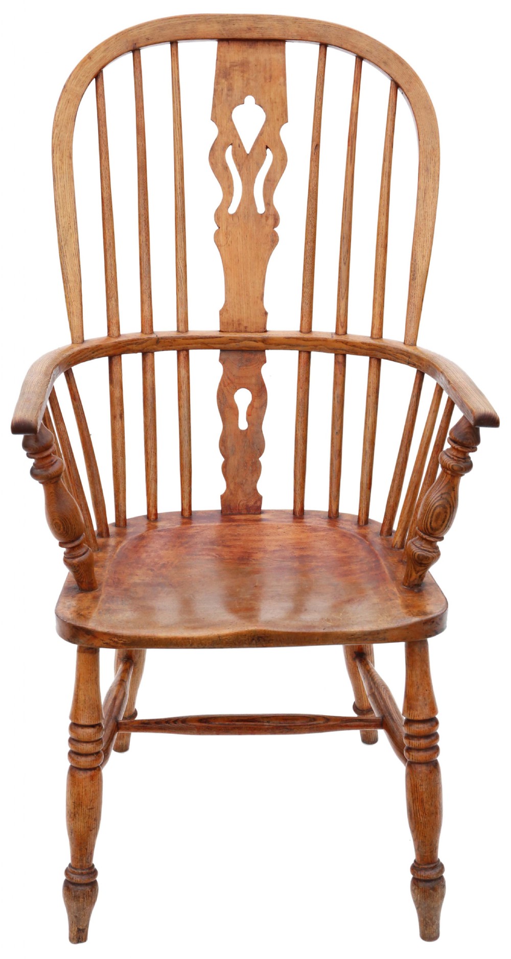 A nineteenth-century English Windsor armchair made from ash and elm wood, featuring a hoop back, pierced central splat, turned legs, and a saddle seat. View II