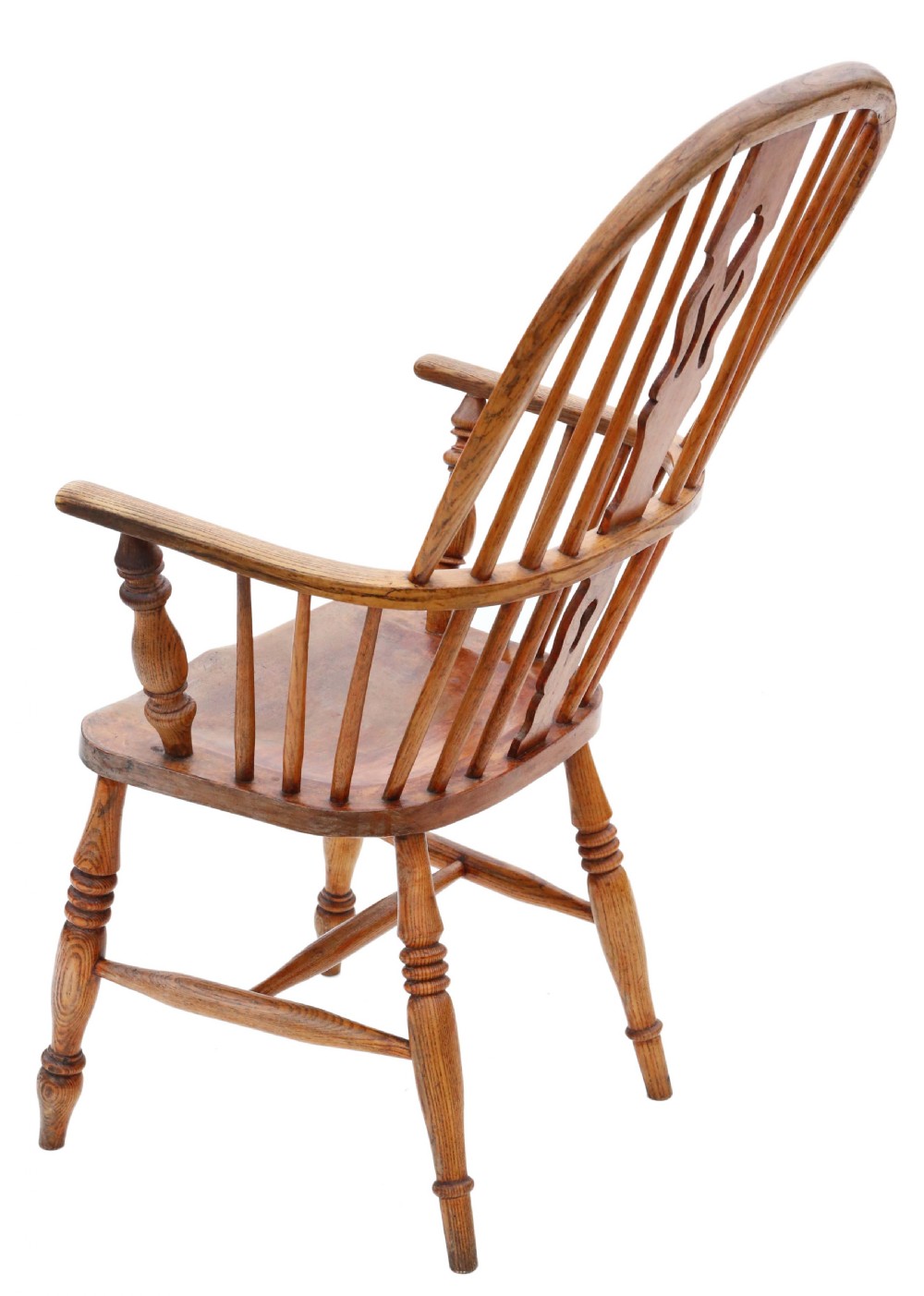 A nineteenth-century English Windsor armchair made from ash and elm wood, featuring a hoop back, pierced central splat, turned legs, and a saddle seat. View III