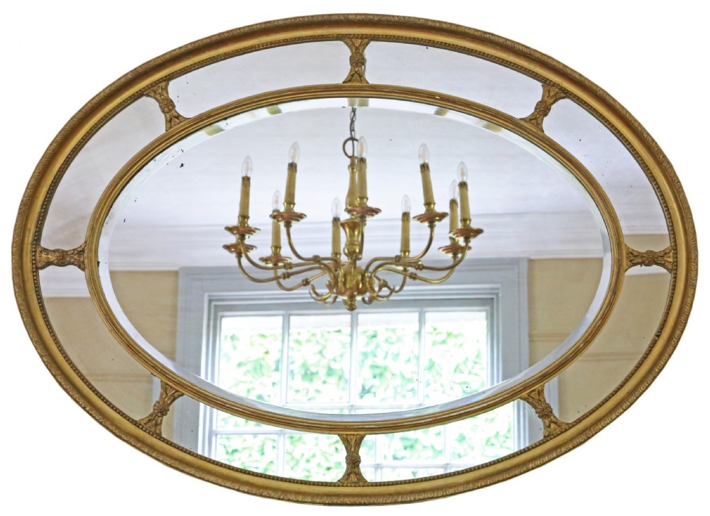 Antique large fine quality oval gilt overmantle cushion wall mirror 19th Century