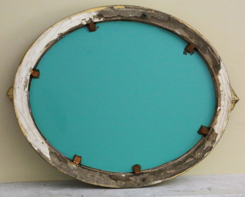 Antique quality 19th Century oval gilt overmantle wall mirror View IV