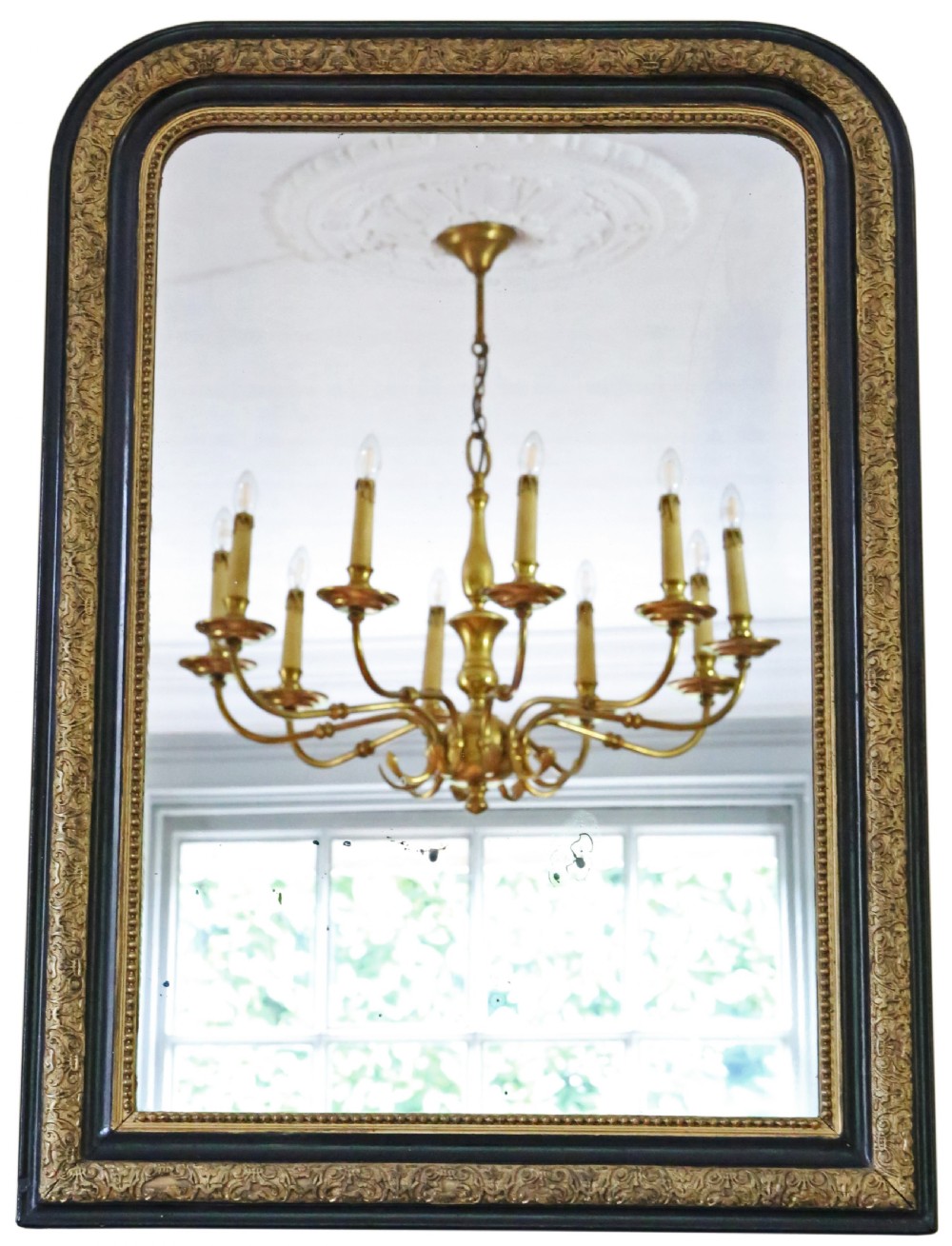 A nineteenth-century rectangular overmantel mirror with rounded top corners, featuring a dark ebonised frame bordered by ornate gilt mouldings. View III