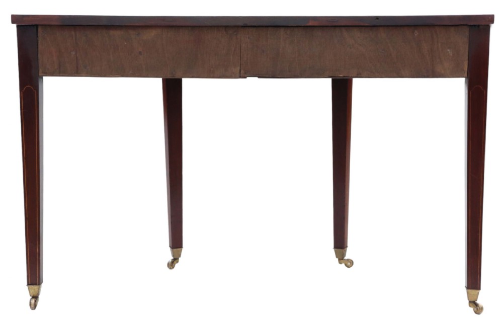 An early nineteenth-century semi-circular mahogany console table featuring line inlay, central drawers with brass ring handles, floral urn marquetry, and square tapered legs on brass castors. View VIII