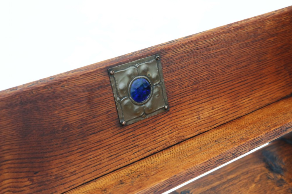Antique quality Art Nouveau oak bookcase book trough stand C1910 In the manner of Liberty View II