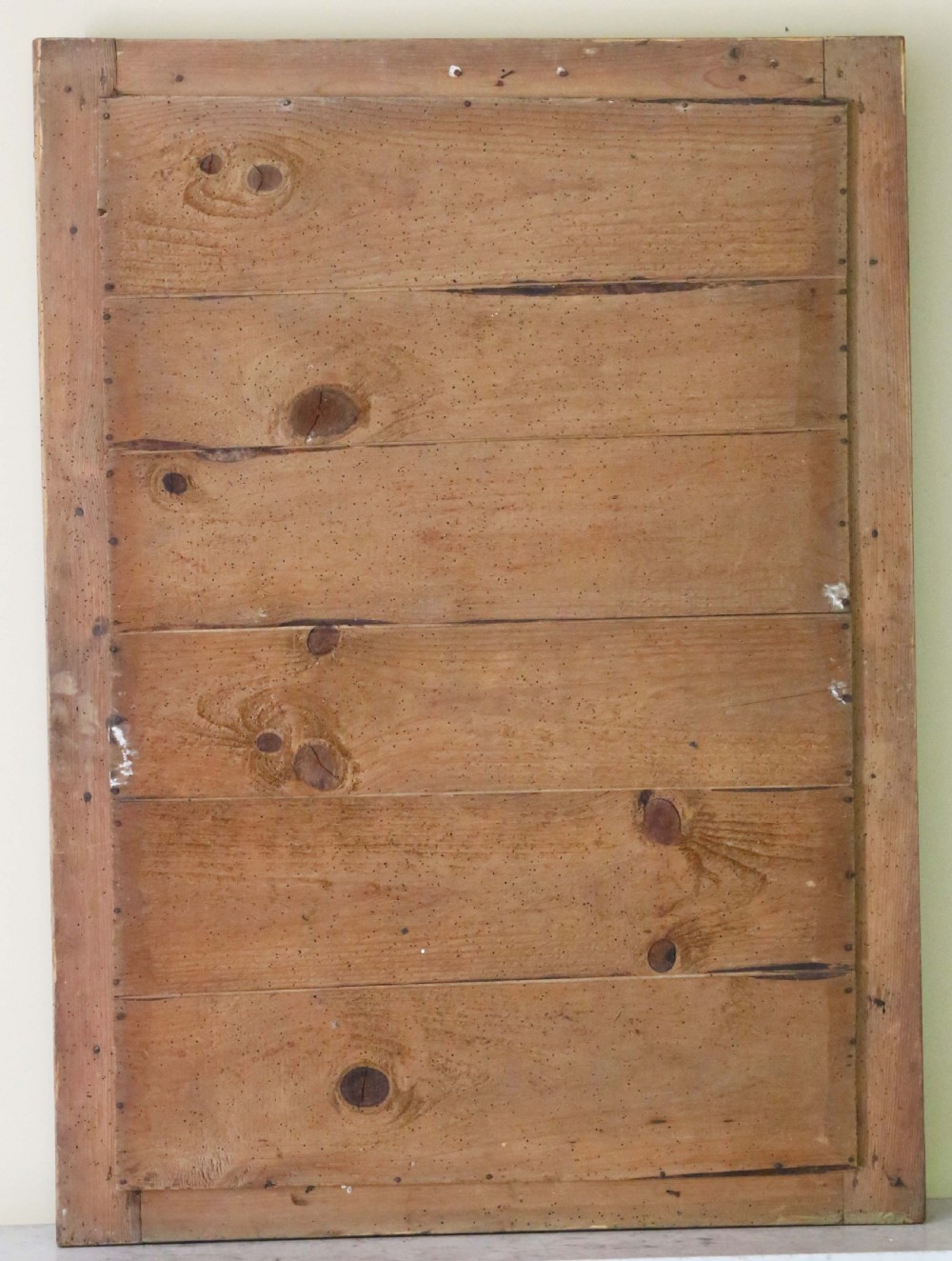 A large rectangular 19th-century wall mirror featuring a gilded frame with spiralled rope twist moulding and carved corner spandrels. View IV