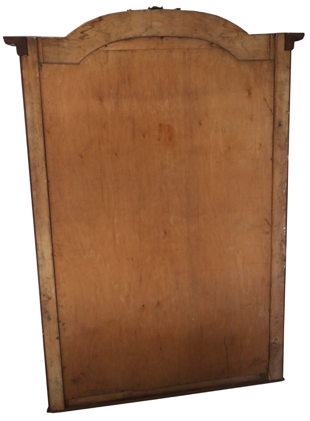 A large early 20th-century mahogany and walnut framed mirror featuring an arched top adorned with a gilt shell motif and corner metal accents. View IV