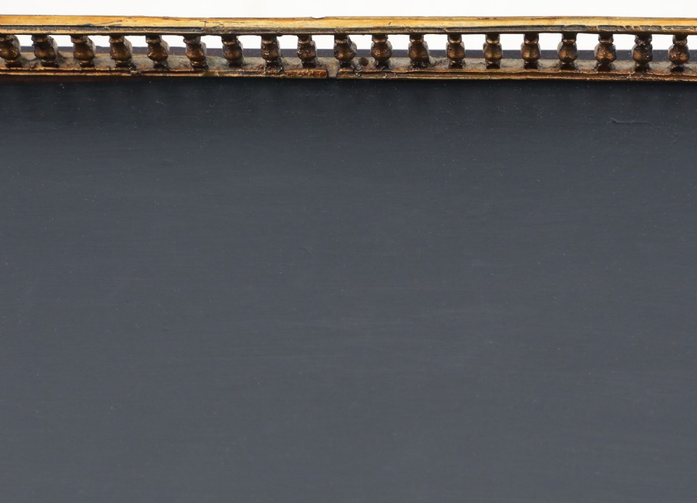 A pair of dark navy painted 19th-century pier cabinets featuring brass galleries, gilded mounts, and glazed doors showing light interior shelves. View IV