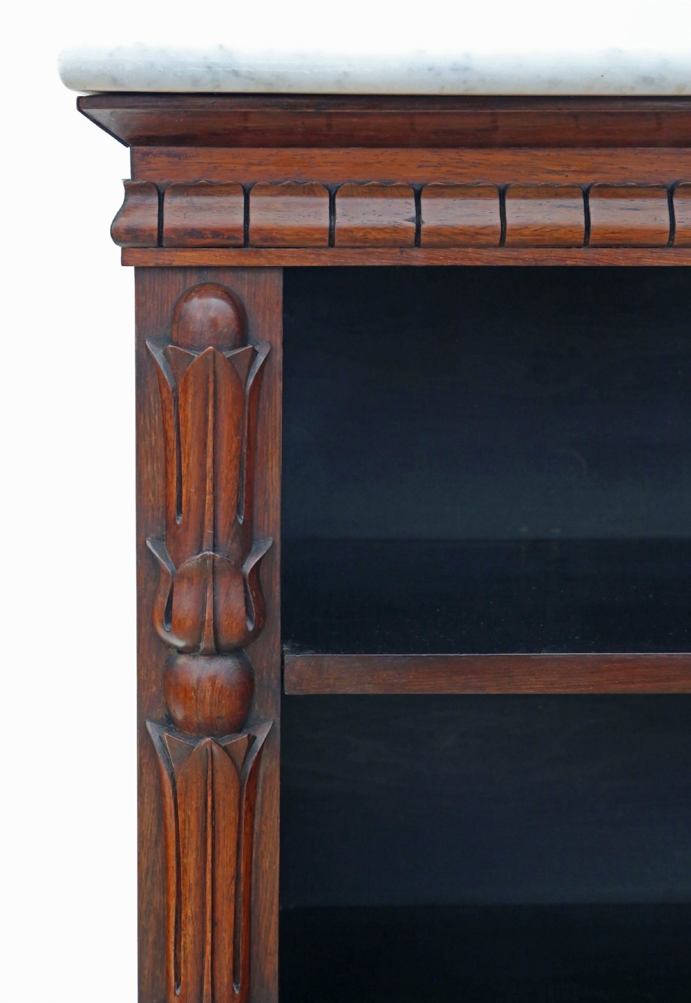 A 19th-century dark rosewood veneered open bookcase featuring carved pilasters and a white marble top. View VIII
