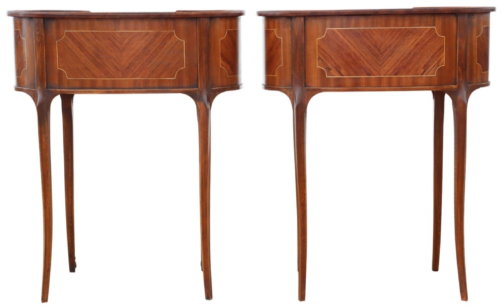 A pair of matching 1920s kidney-shaped timber bedside tables featuring inlaid veneering, central drawers, cabriole legs, and metal knee mounts. View VIII