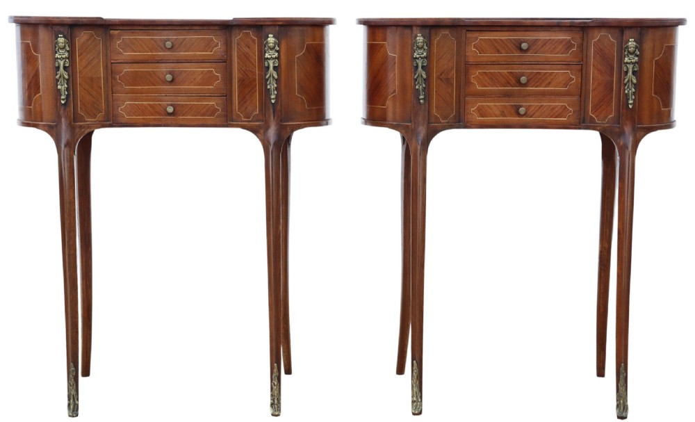 A pair of matching 1920s kidney-shaped timber bedside tables featuring inlaid veneering, central drawers, cabriole legs, and metal knee mounts. View XII