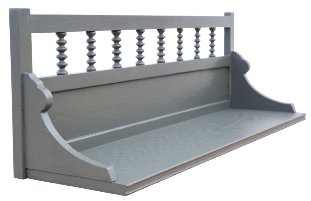 An antique grey painted wooden wall display shelf featuring a top gallery rail with turned spindles and shaped side brackets.