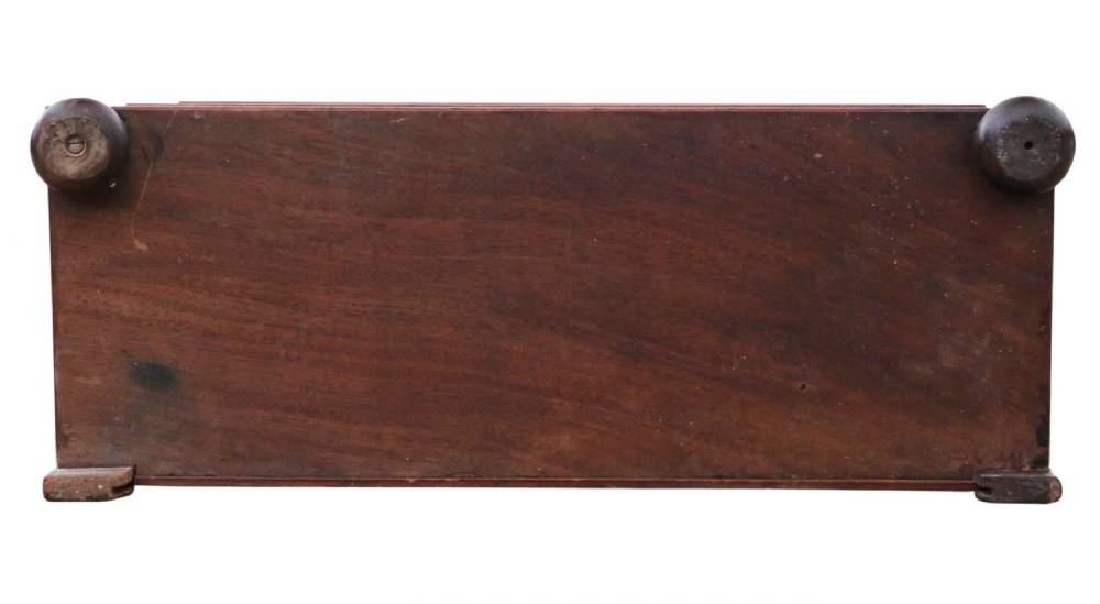 A nineteenth-century Victorian mahogany four-tiered wall bookcase featuring turned column supports, a shaped pediment backboard, and small bun feet. View IX
