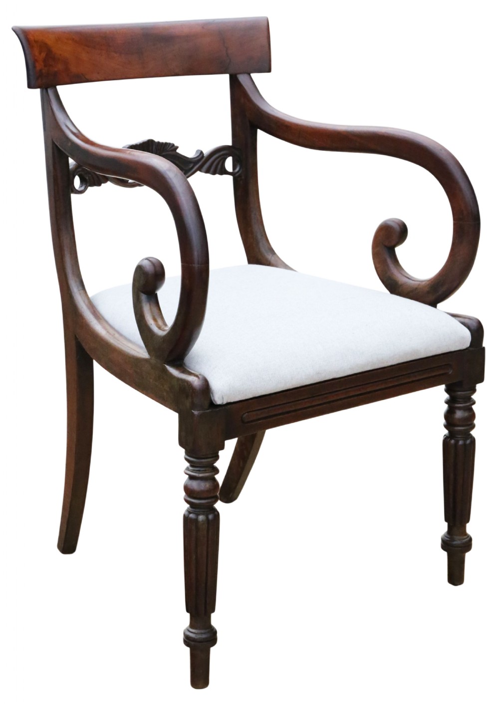 A set of eight antique mahogany dining chairs including six side chairs and two carvers with carved scroll backrests, white upholstered seats, and reeded front legs. View VII