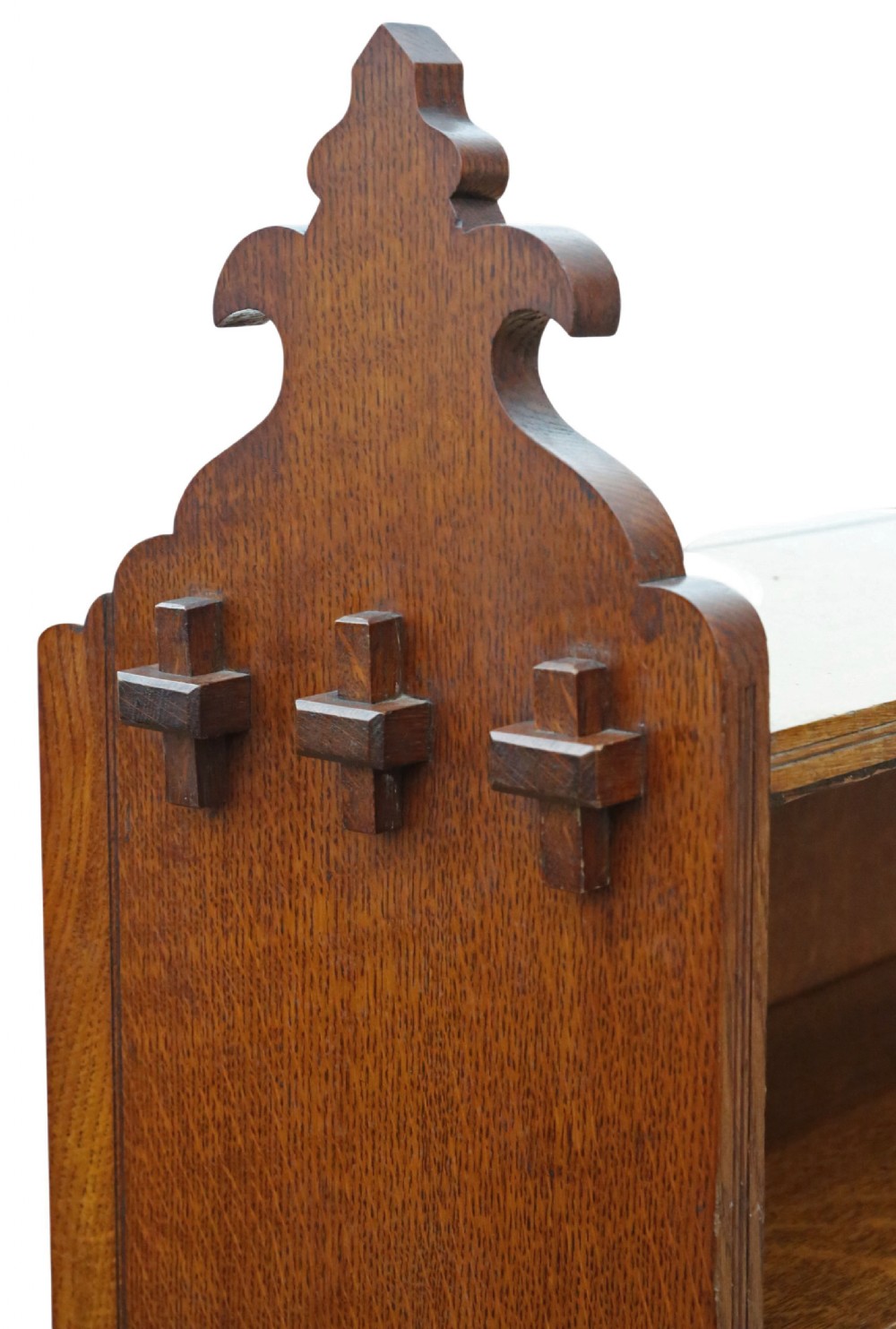 A 19th-century medium oak open bookcase featuring gothic shaped sides with cutout motifs and adjustable internal shelves. View VI