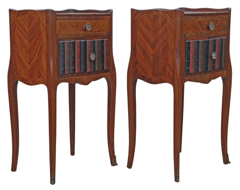 A pair of French parquetry bedside tables featuring slender cabriole legs, a single top drawer, and a lower cabinet concealed by faux leather book spines. View III