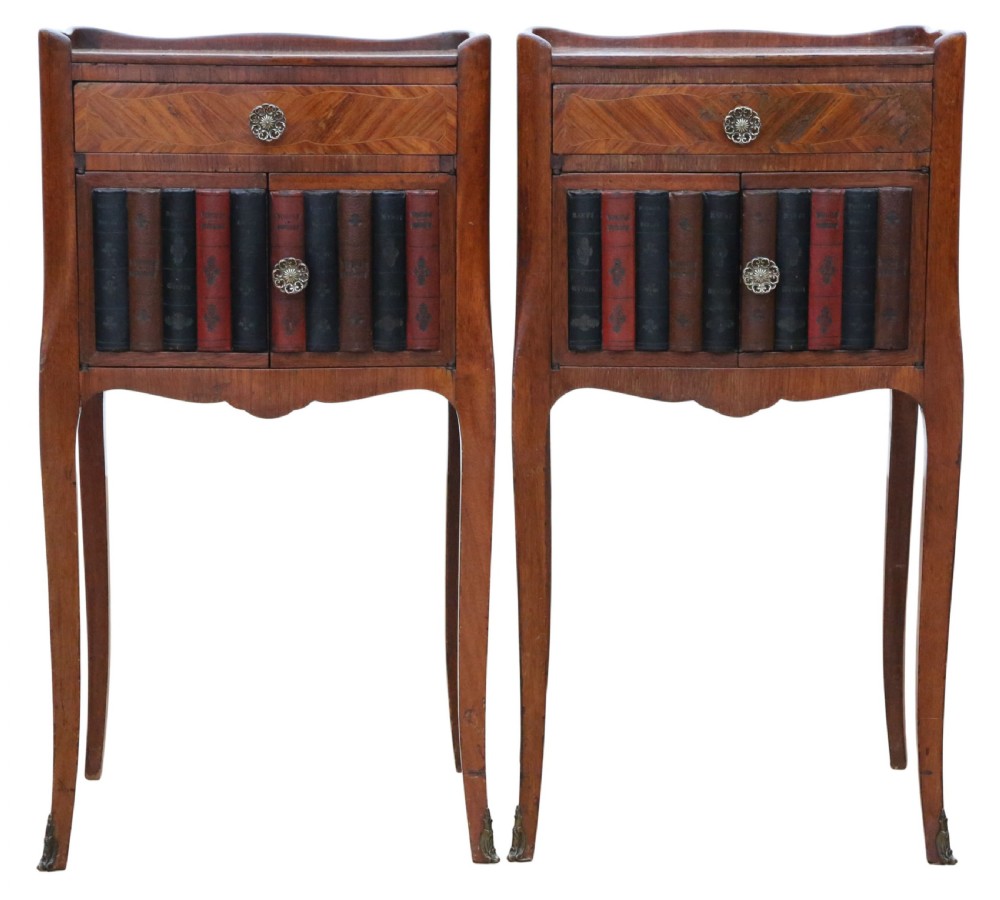 A pair of French parquetry bedside tables featuring slender cabriole legs, a single top drawer, and a lower cabinet concealed by faux leather book spines. View IV
