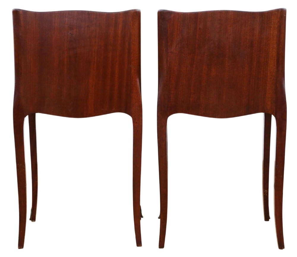 A pair of French parquetry bedside tables featuring slender cabriole legs, a single top drawer, and a lower cabinet concealed by faux leather book spines. View VII