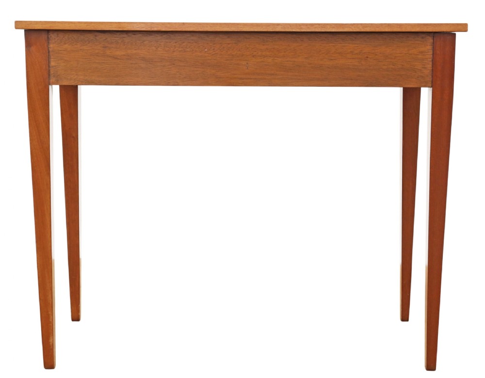 An Edwardian red walnut writing table with two drawers, decorative string inlay, brass ring handles, and tapered square legs. View XI
