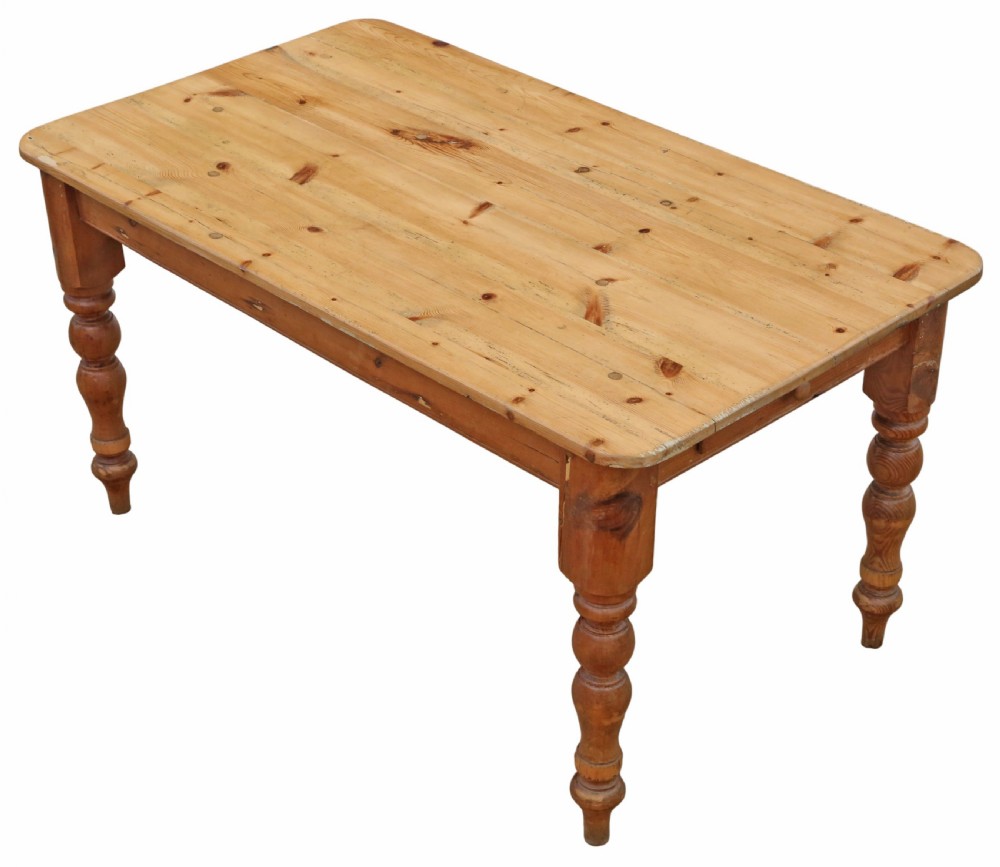 A 19th-century pine kitchen table featuring turned legs, a rectangular plank top, and an end drawer with a turned wood knob. View II