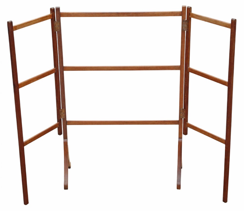 A 19th-century mahogany folding towel rail featuring multiple horizontal bars and hinged articulated panels supported by splayed feet. View VI