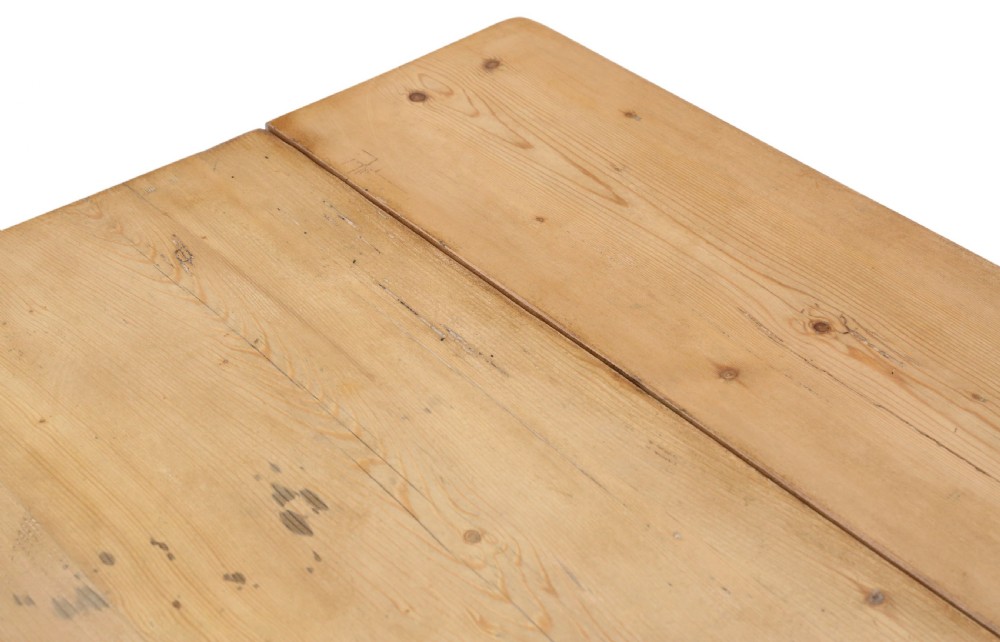 A 19th-century Victorian pine drop-leaf kitchen table featuring turned fruitwood legs, a single end drawer with a wooden knob, and a warm natural finish. View III
