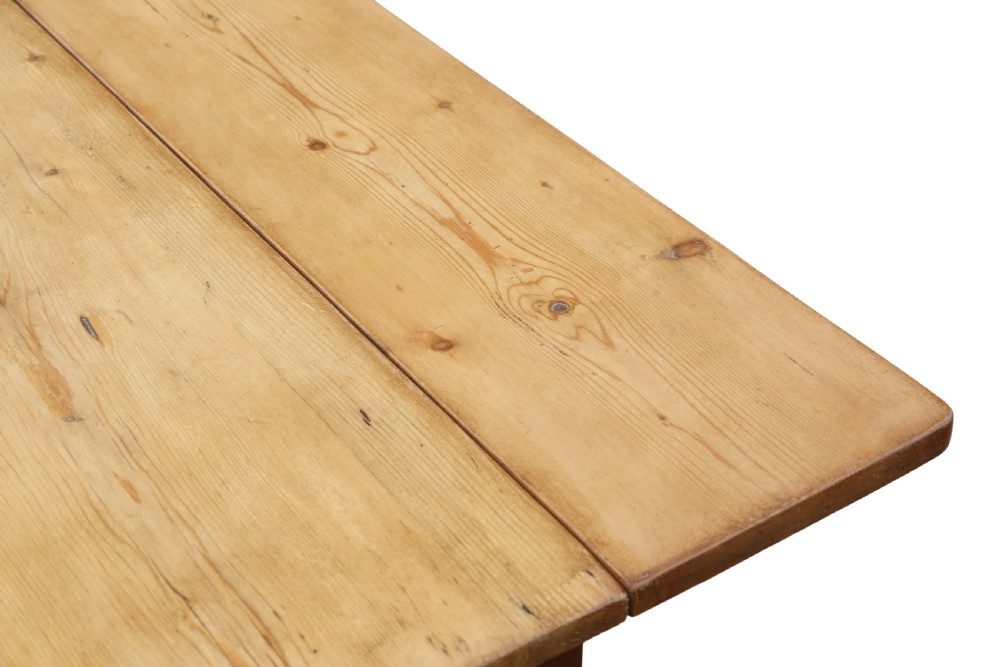 A 19th-century Victorian pine drop-leaf kitchen table featuring turned fruitwood legs, a single end drawer with a wooden knob, and a warm natural finish. View V