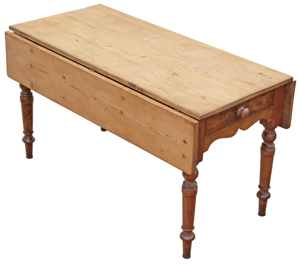 A 19th-century Victorian pine drop-leaf kitchen table featuring turned fruitwood legs, a single end drawer with a wooden knob, and a warm natural finish. View IX