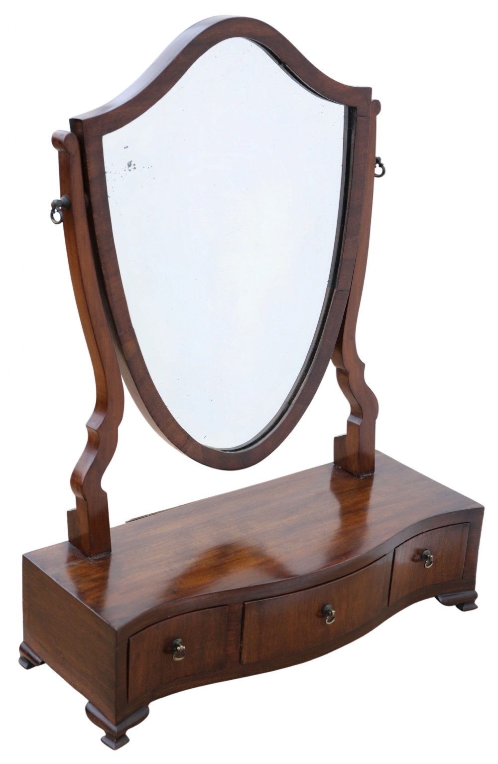 A 19th-century mahogany dressing table mirror featuring an arched shield-shaped glass frame supported by curved uprights above a serpentine base with three small drawers.
