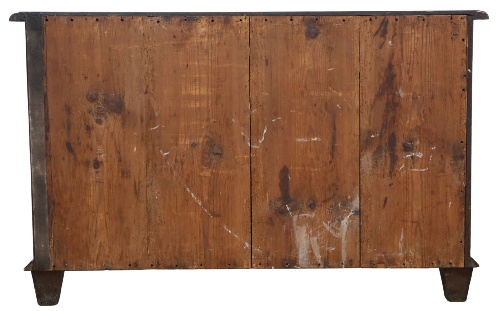 An 18th-century Continental oak and walnut chest of drawers featuring a serpentine front, crossbanded top, and three drawers with ornamental brass handles. View VIII