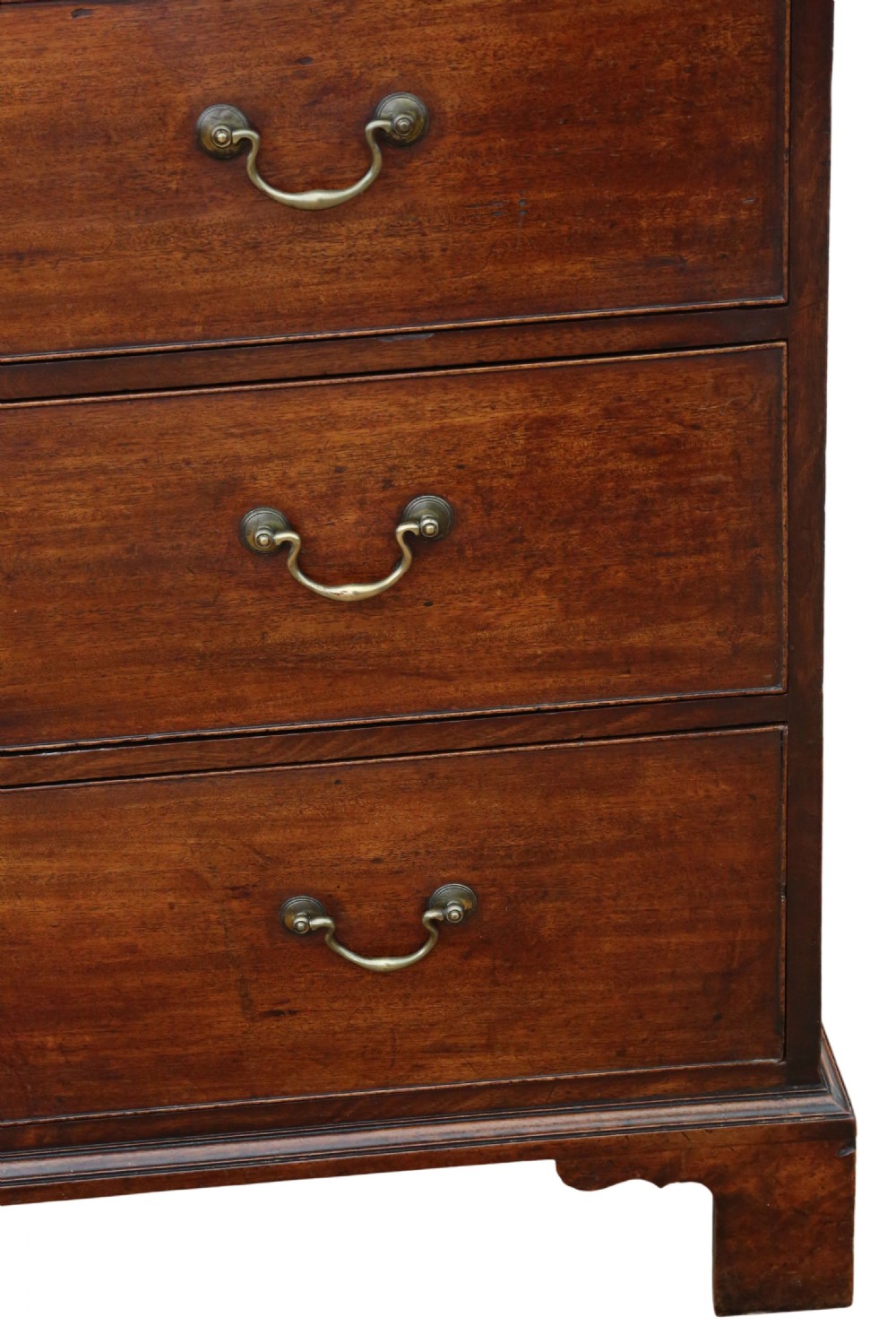 A late 18th-century Georgian mahogany chest of drawers featuring two short over three long graduated drawers with brass handles and bracket feet. View VI