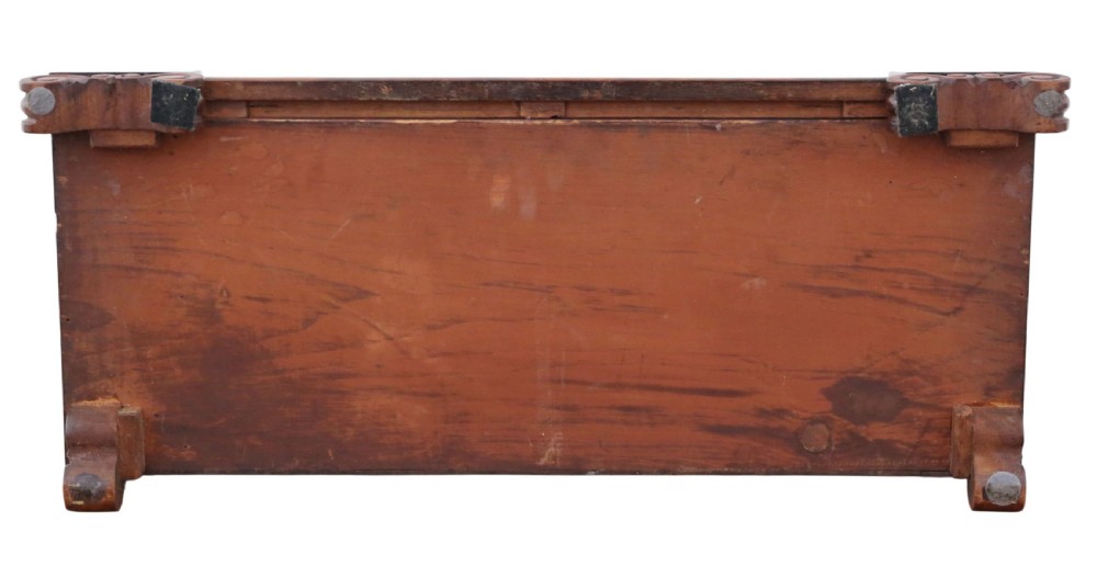 A nineteenth-century Regency mahogany dressing table mirror with a rectangular swivelling frame set between vertical posts on a plinth base with scroll feet. View VIII