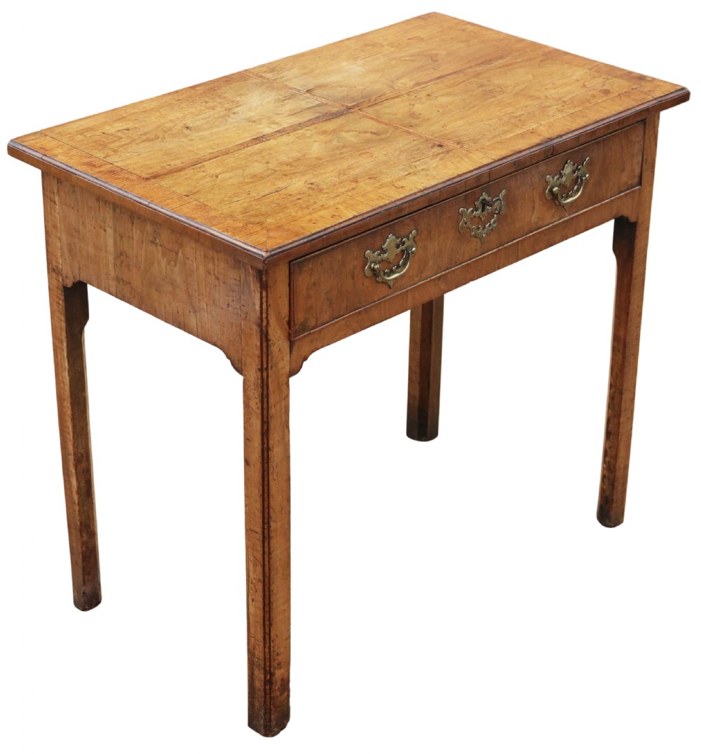 An 18th-century Georgian walnut writing table featuring a quarter-veneered top, single drawer with brass drop handles, and straight square legs. View IV