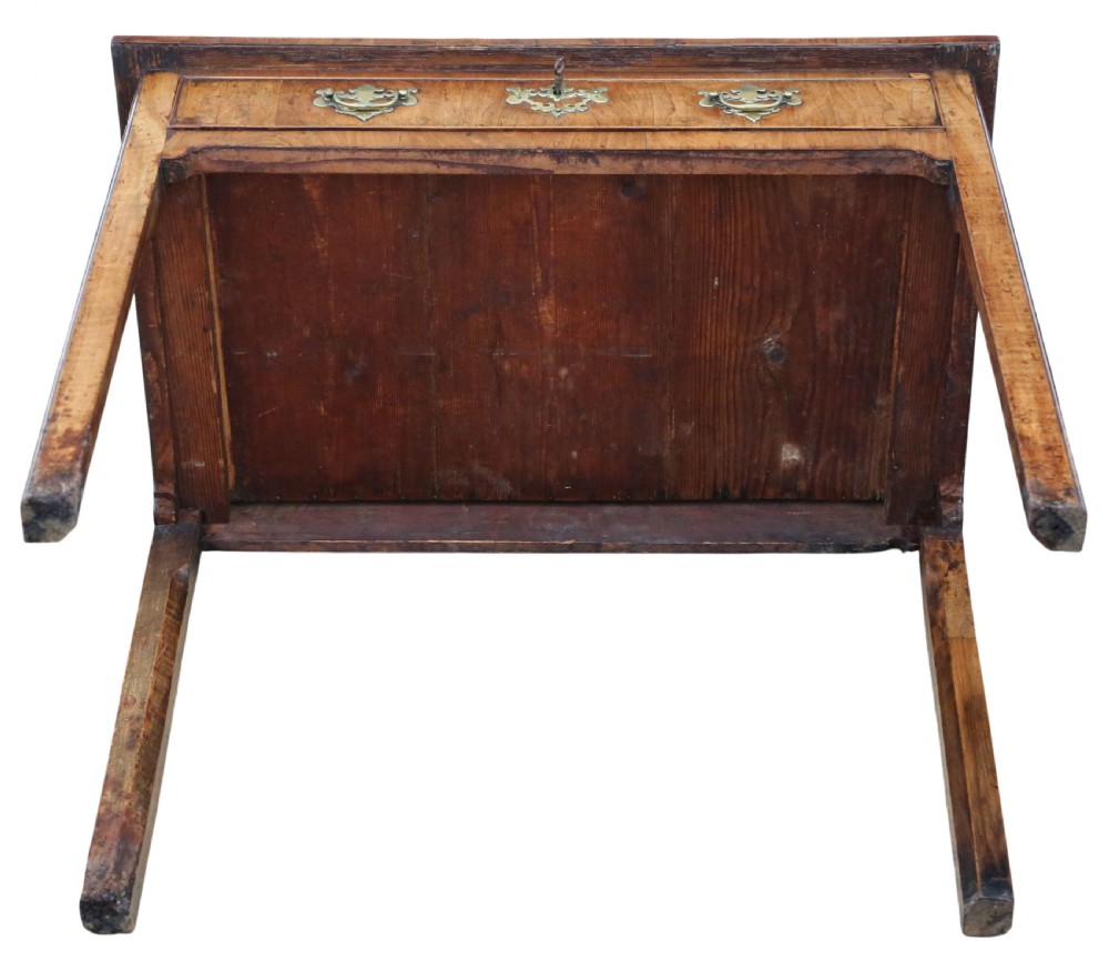 An 18th-century Georgian walnut writing table featuring a quarter-veneered top, single drawer with brass drop handles, and straight square legs. View VIII