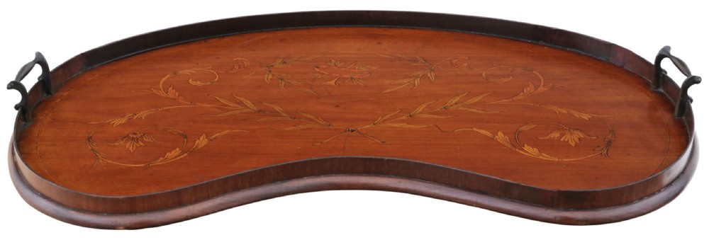 A kidney-shaped mahogany serving tray featuring floral marquetry inlay, a raised gallery, and twin brass handles. View II