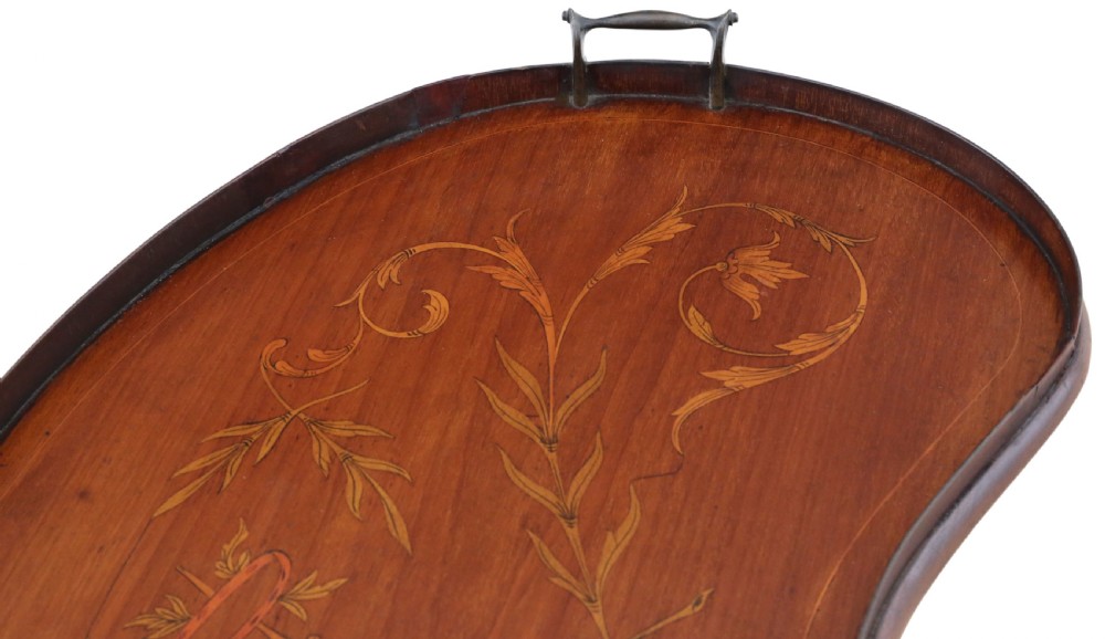 A kidney-shaped mahogany serving tray featuring floral marquetry inlay, a raised gallery, and twin brass handles. View III