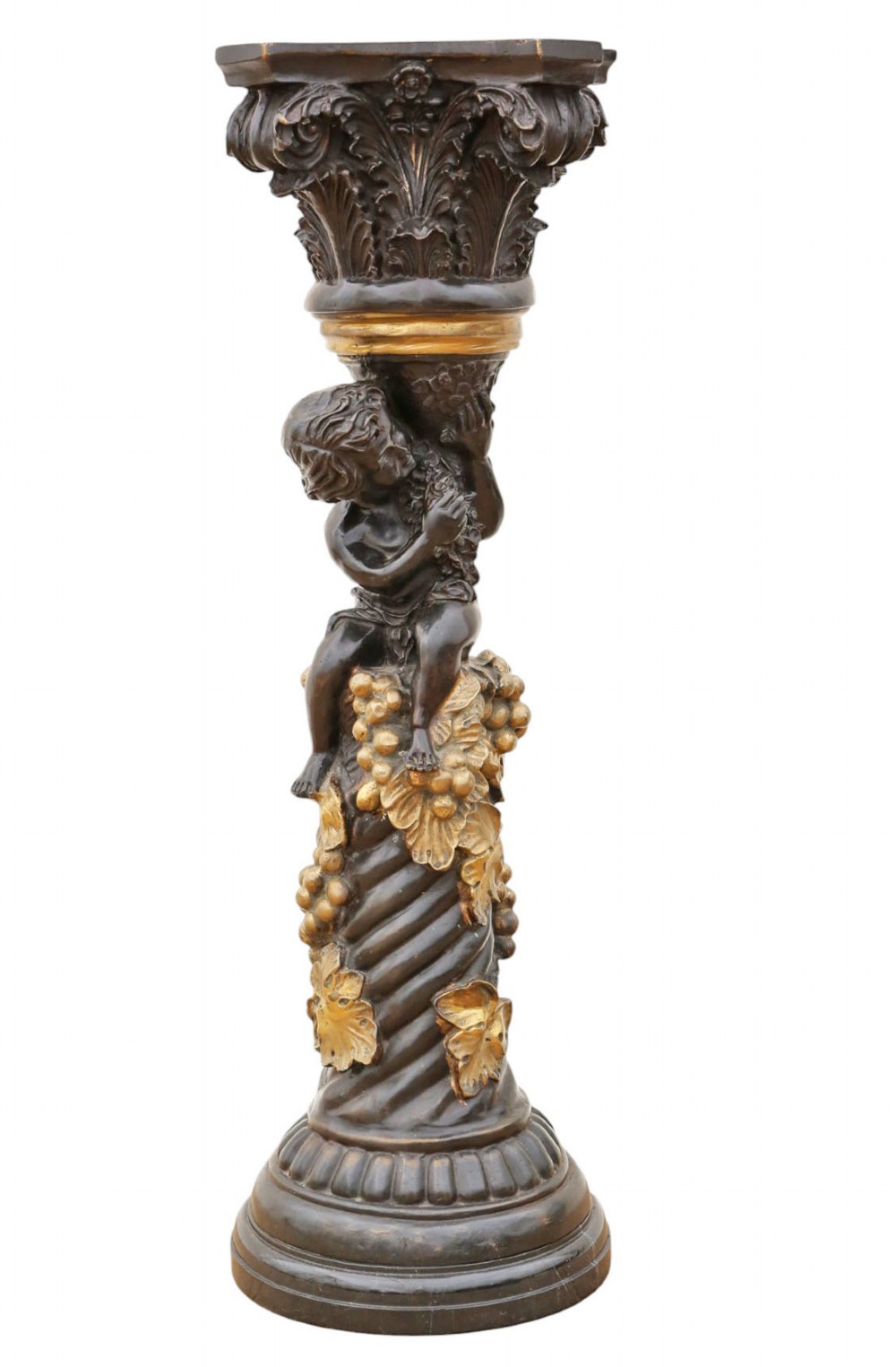 A French dark bronze and gilt pedestal stand featuring an acanthus-carved capital top, a central putto among gilded grapevines, and a stepped circular base.